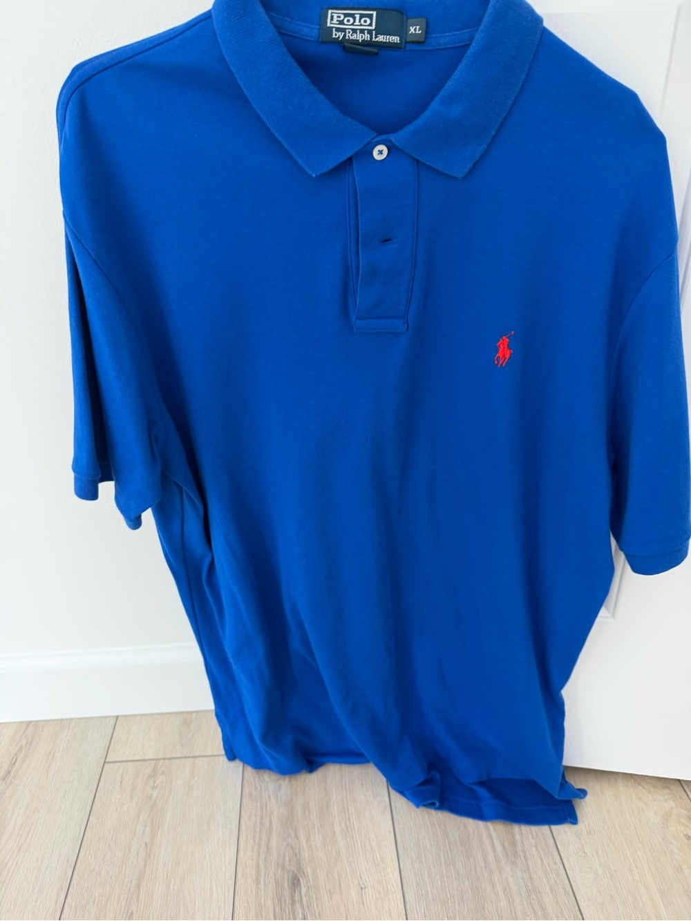 Polo by Ralph Lauren Blue Polo with Red Pony Logo. New